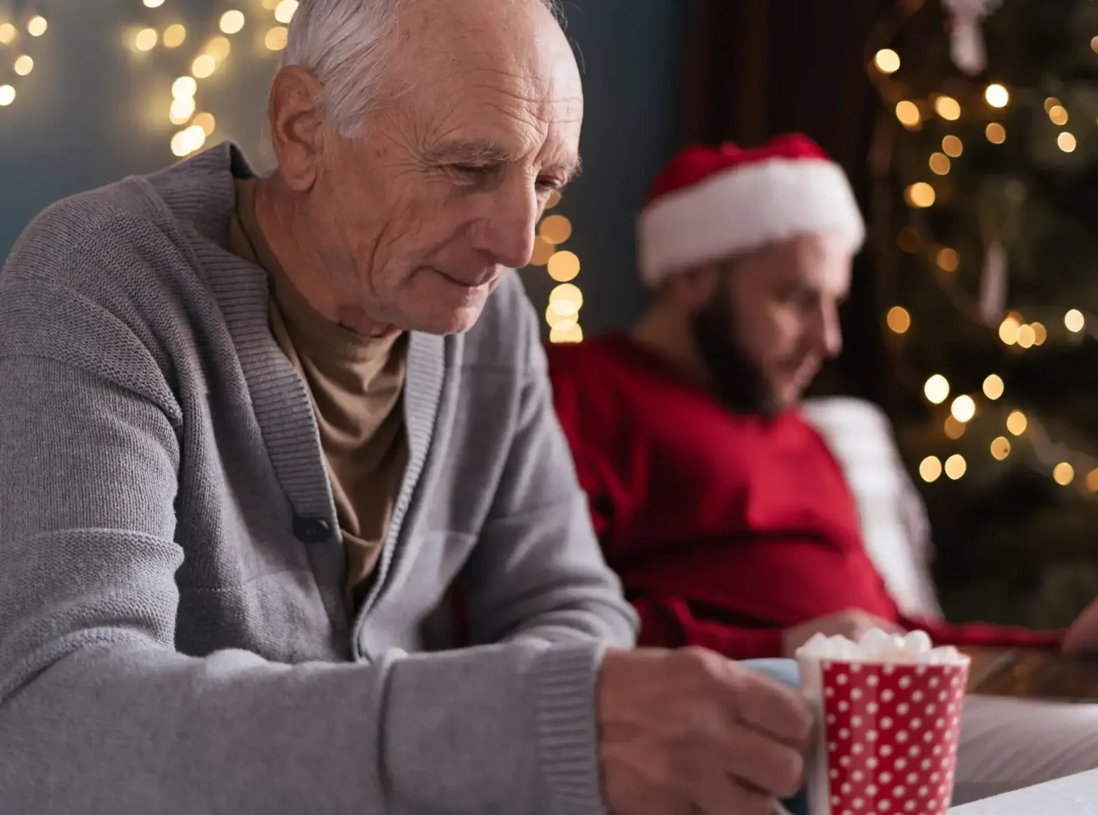 A senior man looking sad while coping with the first Christmas without a loved one at Notre Dame Health Care