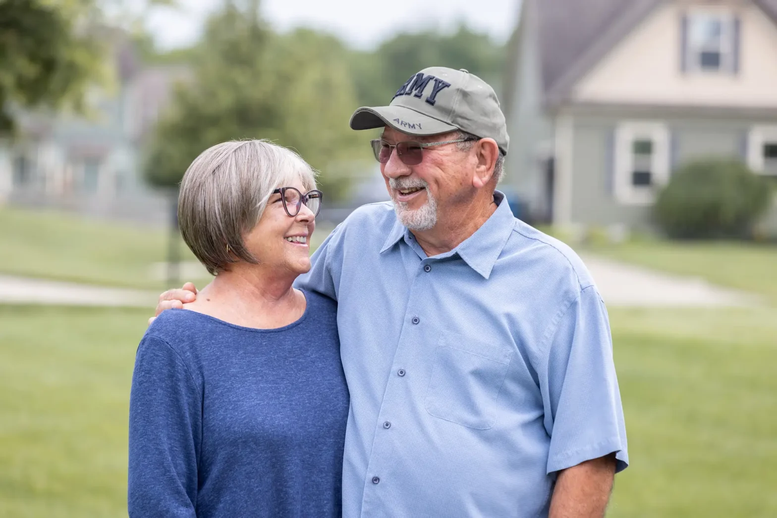 senior couple, smiling after discussing assisted living financial assistance for veterans